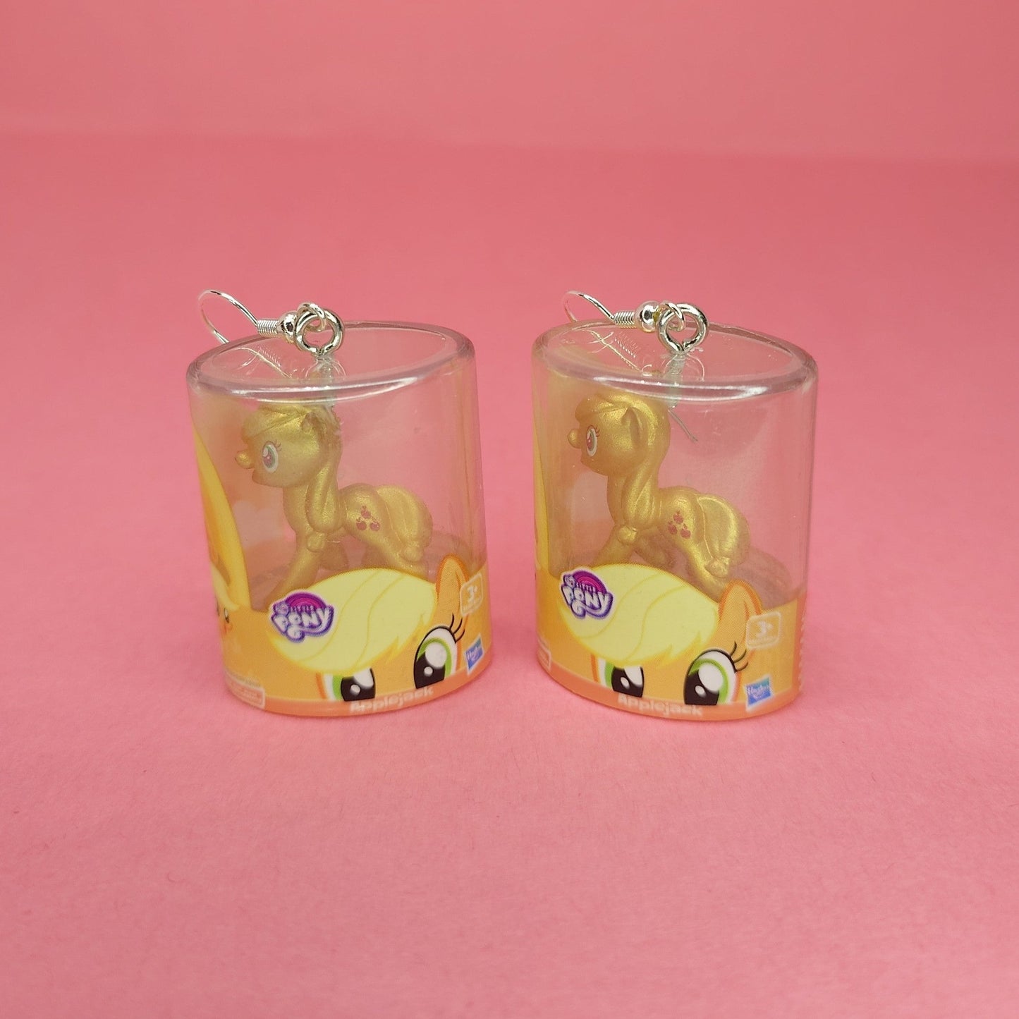 Applejack Mini Pony earrings.
