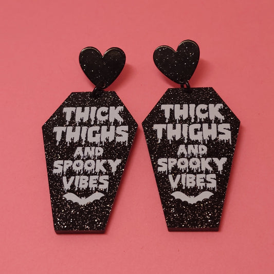 Thick thighs and spooky vibes earrings
