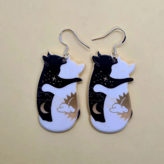 Sun and moon cuddling cat earrings. - Strawberry Moon Jewellery 