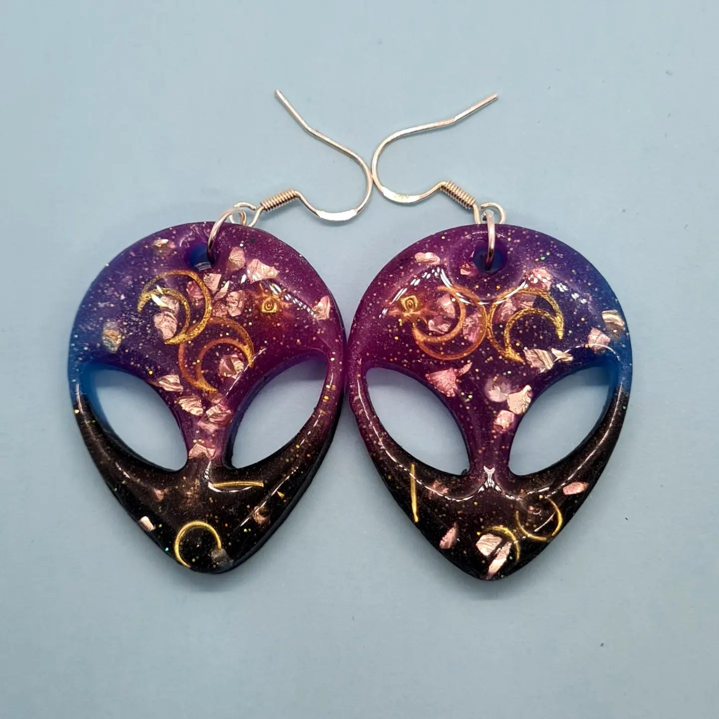 Cosmic Steve moon earrings. Pink glass and gold moon embellishment. Glow in the dark. - Strawberry Moon Jewellery 